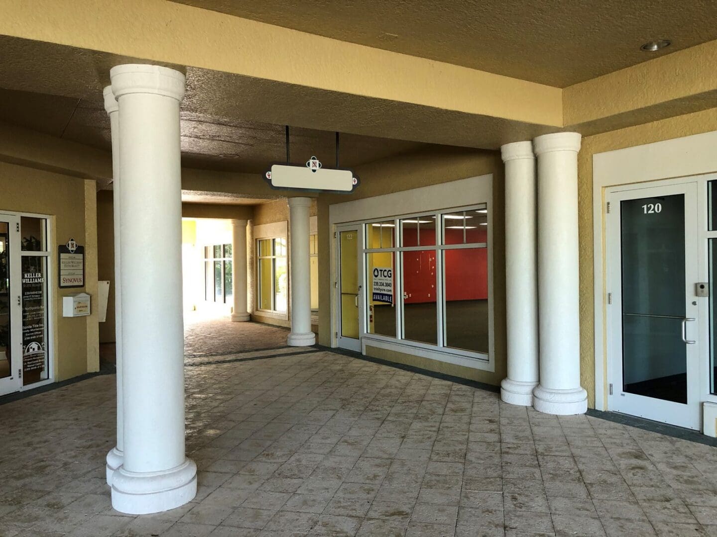Covered breezeway and storefronts at North Bay Village, 26381 S Tamiami Trail, Bonita Springs, FL