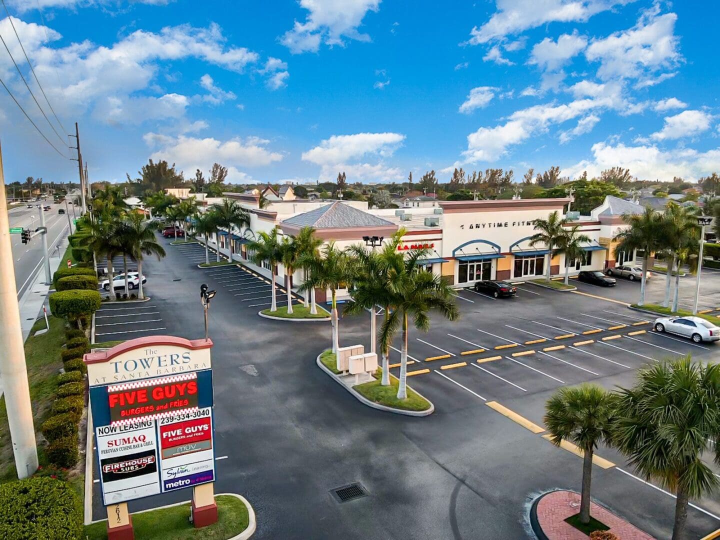 Elevated view of Cape Coral Towers II and its pylon sign, 2708 Santa Barbara Blvd, Cape Coral, FL