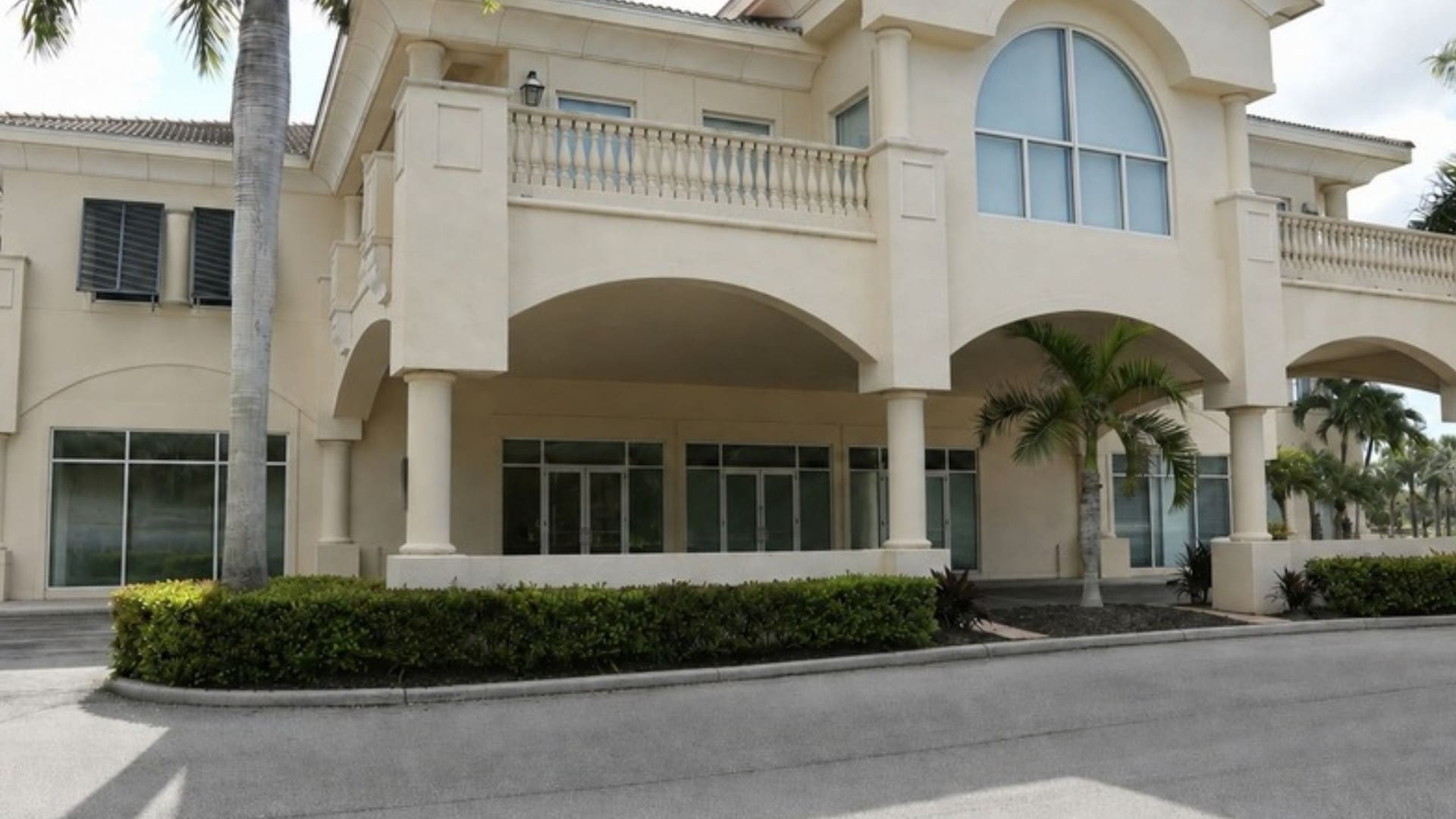 Arched entry facade at North Bay Village, Bonita Springs, FL